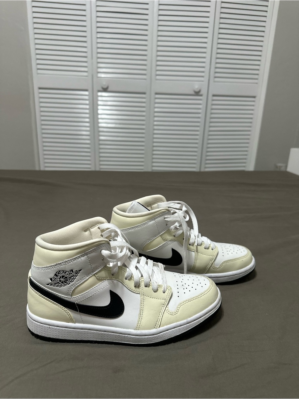 Nike Air Jordan High-Top Sneakers in Cream and Black